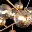 Immagine di Lampadario A Sospensione Sfere Vetro Oro Moderno Dallas 24 Luci Maytoni