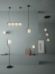 Immagine di Lampadario Lineare Nero 4 Sfere Vetro Bianco Maui ACB