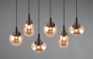Immagine di Lampadario Lineare Per Tavolo Nero Con Vetri Ambra Lumina Trio