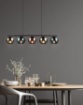Immagine di Sospensione in Linea 5 Paralumi Sfere Vetro Specchiato Multicolor Azzurro Verde e Rame Sheldon Trio Lighting 