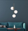 Immagine di Lampadario Oro Verticale 3 Sfere Vetro Bianco Niva Smarter
