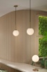 Immagine di Lumetto Decorativo Parma Oro Antico con Paralume Sfera Vetro Opale Ø18 cm ACB 
