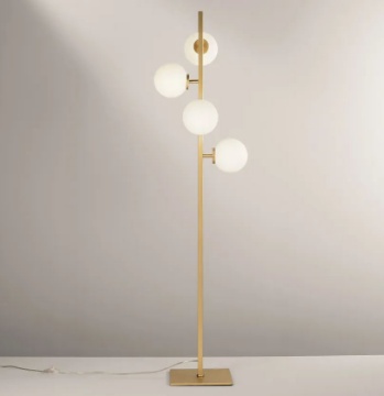 Immagine di Piantana Da Salotto Oro Con Sfere Vetro Bianco Enoire Luce Ambiente Design
