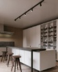 Immagine di Proiettore Orientabile GU10 Squib Nero Con Adattatore Trifase Per Binario Track Intec