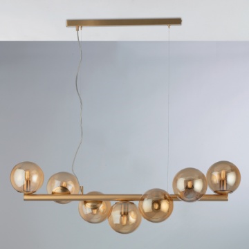 Immagine di Lampadario Oro Con Sfere Ambra 7 Luci Per Tavolo Loop Leolux