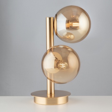 Immagine di Lampada Da Tavolo Oro Due Sfere Ambra Loop Leolux 2xE14