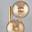 Immagine di Lampada Da Tavolo Oro Due Sfere Ambra Loop Leolux 2xE14