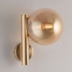 Immagine di Applique Oro Camera Da Letto Con Sfera Ambra Loop Leolux