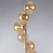 Immagine di Piantana Soggiorno Oro 9 Luci Con Vetri Sfera Ambra Loop Leolux