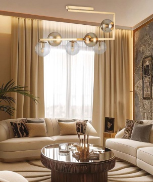 Immagine di Plafoniera Oro Looper Con Sfere Vetro Ambra Trasparente